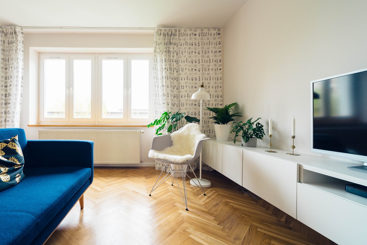 Warm, light-filled living room built by HB Design and Construction