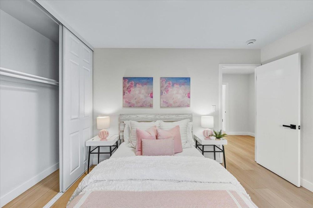 Symmetric staged bedroom