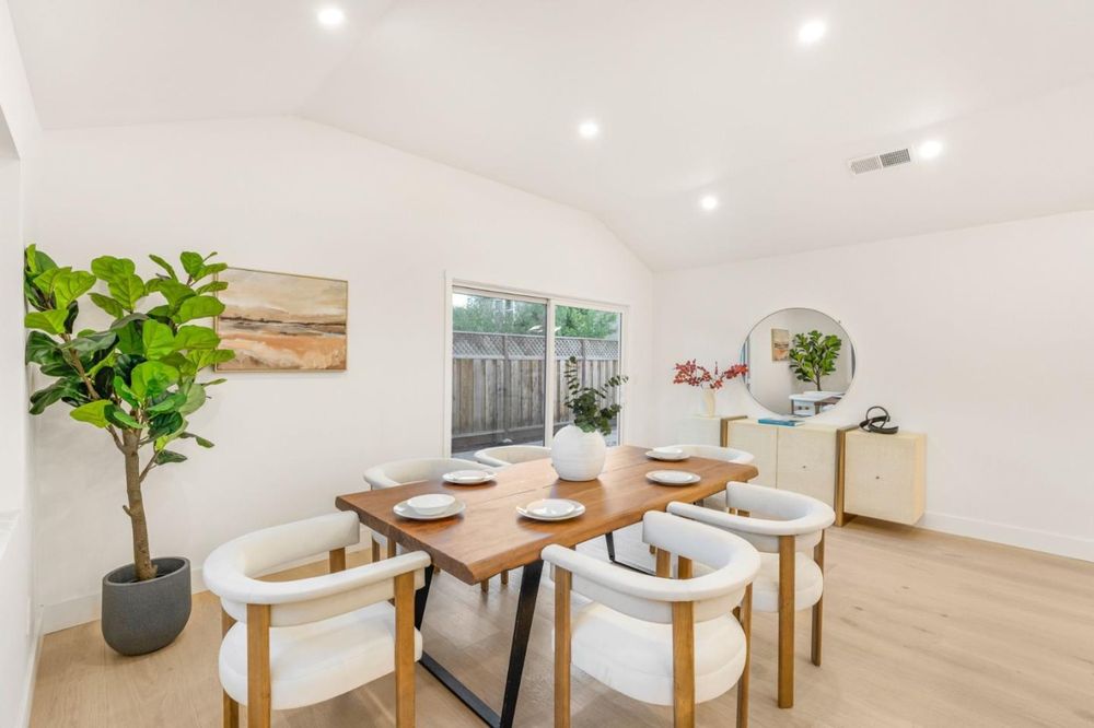 Dining room with vaulted ceiling